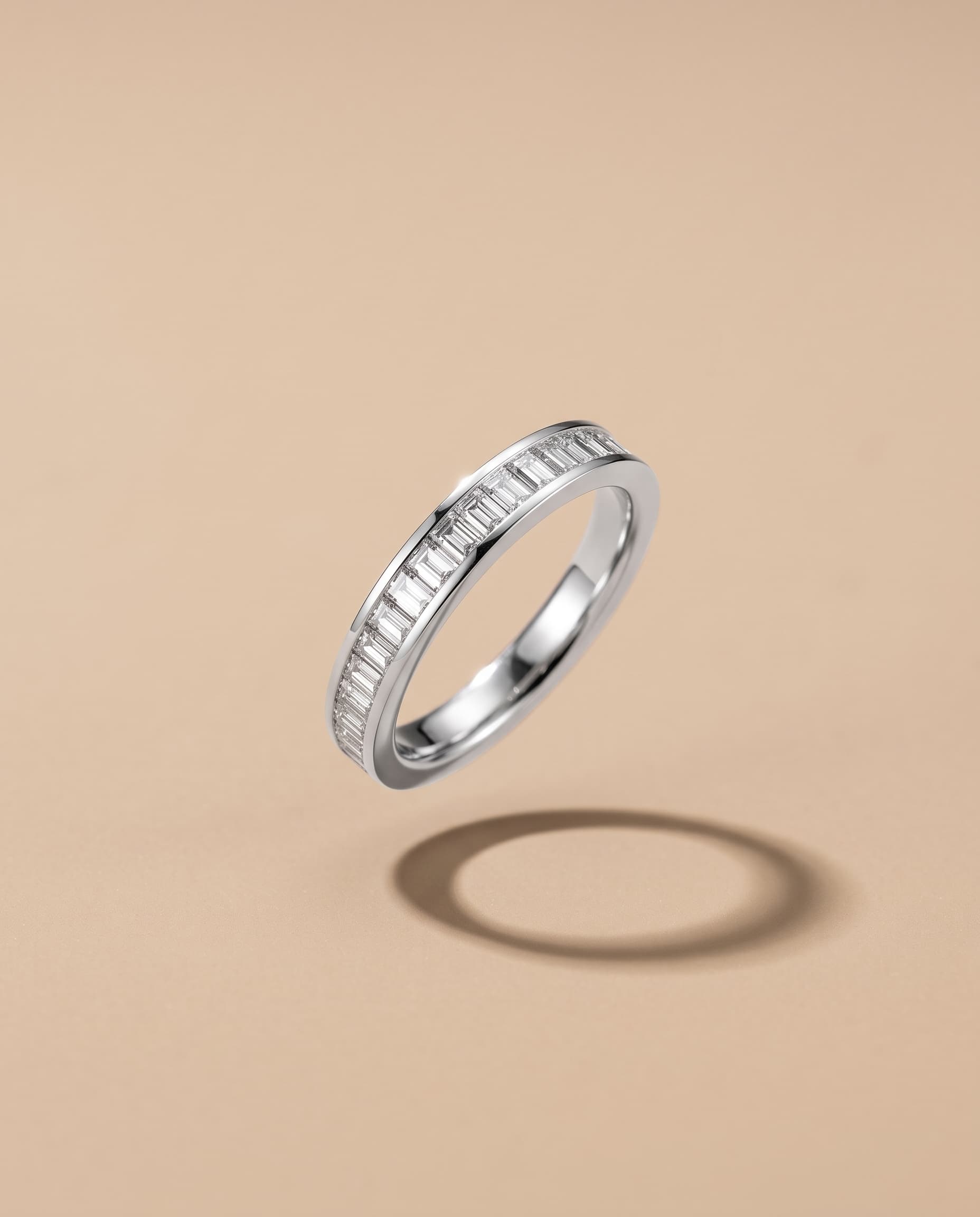 Baguette half eternity band ring